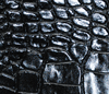 swatch of black alligator-embossed leather