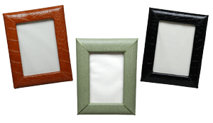 brown, black and jade green reptile-embossed leather picture frames