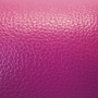 swatch of magenta pebble-textured cowhide